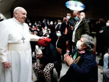 Pope Francis marks name day with Rome’s poor receiving COVID-19 vaccine.